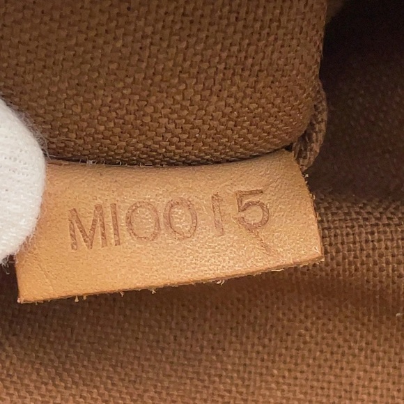 Louis Vuitton Pochette Marelle - Picture 15 of 15